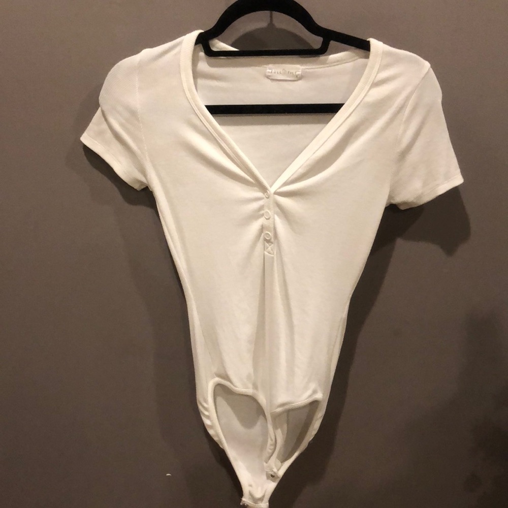 White V-neck w/button detail bodysuit